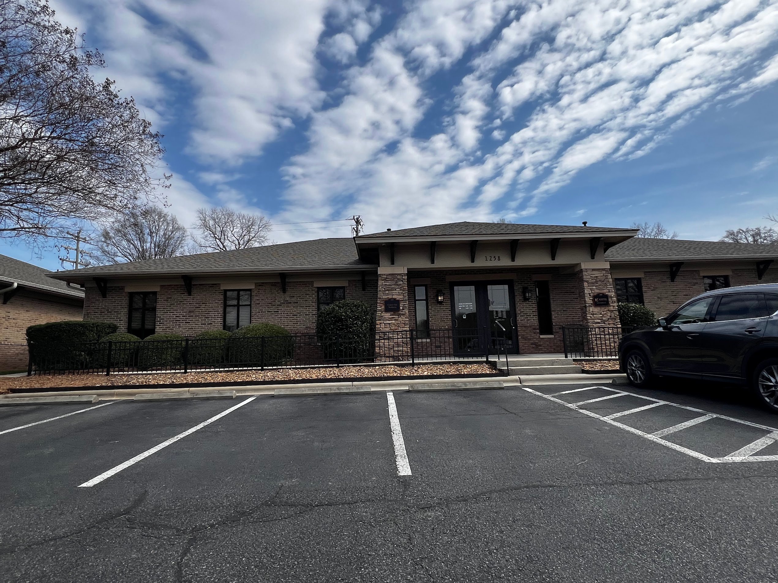 Exterior entrance of the medical office condominium at 1258 Mann Drive Unit 100 in Matthews, North Carolina